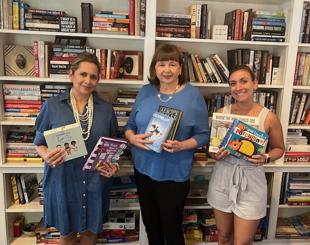 Book donation to Harvest Family Success Center